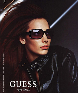 Model wearing GUESS glasses